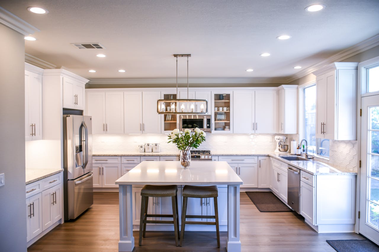 Bright modern kitchen with white cabinets and a central island